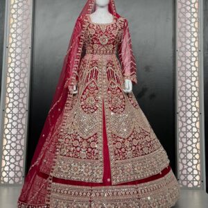 Maroon bridal anarkali suit with heavy golden embroidery displayed on white mannequin in decorative frame